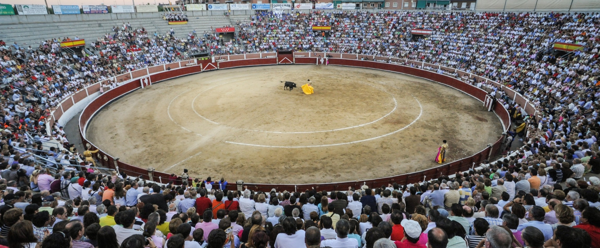 crowd watching bullfight in arena Madrid Spain